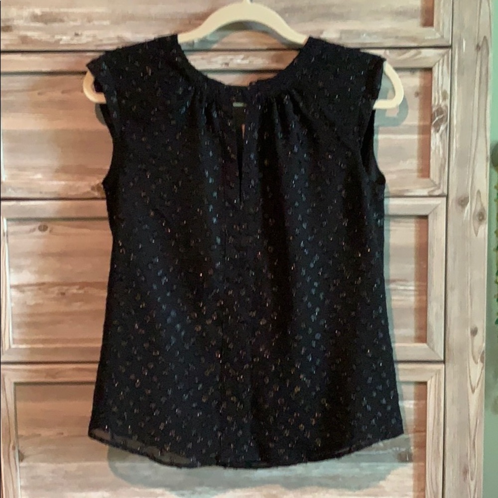 Black top with sparkly dots